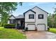 Charming two-story home boasts a well-maintained yard and a two-car garage at 18 Amanda Dr, Dallas, GA 30157