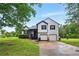 Charming two-story home boasts a well-maintained yard and a two-car garage at 18 Amanda Dr, Dallas, GA 30157