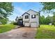 Charming two-story home boasts a well-maintained yard and a two-car garage at 18 Amanda Dr, Dallas, GA 30157