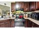 Functional kitchen with practical layout and necessary appliances at 18 Amanda Dr, Dallas, GA 30157