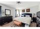 Bedroom with wooden floors, a comfortable bed and modern furniture at 18 Amanda Dr, Dallas, GA 30157