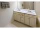 Bathroom vanity with double sinks, cabinets and drawers for storage at 3335 Ivy Lake Dr, Buford, GA 30519