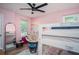 Playful bedroom with bunkbeds, a rainbow painted wall, and plenty of sunlight at 3335 Ivy Lake Dr, Buford, GA 30519