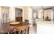 Open dining area with a view into the kitchen and living spaces, perfect for entertaining at 3335 Ivy Lake Dr, Buford, GA 30519