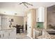 Bright kitchen featuring granite countertops, stainless steel appliances, and an adjacent dining area at 3335 Ivy Lake Dr, Buford, GA 30519