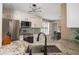 Well-appointed kitchen featuring granite countertops, stainless steel appliances, and stylish backsplash at 3335 Ivy Lake Dr, Buford, GA 30519