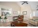 Inviting living room featuring a granite breakfast bar, stylish furnishings, and hardwood floors at 3335 Ivy Lake Dr, Buford, GA 30519