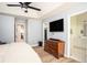 Spacious main bedroom features natural light and easy access to the en suite bathroom at 3335 Ivy Lake Dr, Buford, GA 30519