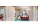 Well-lit bathroom featuring a vanity with a sink, shower with tub, and blue floor mat at 805 Pleasant Hill Nw Rd # 343, Lilburn, GA 30047