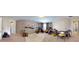 Spacious bedroom featuring carpet, a decorative brick-style accent wall, and a desk at 805 Pleasant Hill Nw Rd # 343, Lilburn, GA 30047