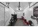 Bright home gym featuring an elliptical, weight bench, free weights, and motivational art, ideal for fitness enthusiasts at 805 Pleasant Hill Nw Rd # 343, Lilburn, GA 30047
