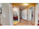 Hallway featuring doorways leading to a bathroom and closet, with neutral paint and carpet at 805 Pleasant Hill Nw Rd # 343, Lilburn, GA 30047