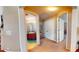 Open hallway featuring carpet floors, a closet, and an entrance to a tiled bathroom at 805 Pleasant Hill Nw Rd # 343, Lilburn, GA 30047