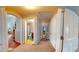 Hallway with bathroom, closet, table, and views of the living room and other spaces at 805 Pleasant Hill Nw Rd # 343, Lilburn, GA 30047