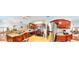 A stylish kitchen with granite countertops, stainless steel appliances, and cherry wood cabinets at 805 Pleasant Hill Nw Rd # 343, Lilburn, GA 30047