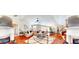 A panoramic view of an open living space featuring hardwood floors, neutral walls, and a ceiling fan at 805 Pleasant Hill Nw Rd # 343, Lilburn, GA 30047
