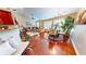 Bright living room with wood floors, plenty of natural light, modern furnishings, and decorative plants at 805 Pleasant Hill Nw Rd # 343, Lilburn, GA 30047