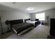 Bedroom with two beds, neutral carpet, and a sunny window at , Loganville, GA 30052