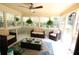Relaxing sun room with lots of windows, tile floors and comfortable seating at , Loganville, GA 30052