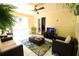 Inviting sun room with cozy seating, and views of the outdoors at , Loganville, GA 30052