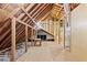 Unfinished attic area with exposed rafters and ventilation system at 3133 Callie Still Rd, Lawrenceville, GA 30045