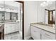Elegant bathroom featuring granite countertops, dual sinks, and modern fixtures at 3133 Callie Still Rd, Lawrenceville, GA 30045