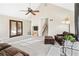 Bright living room features vaulted ceilings, a wood burning stove, and access to a private balcony at 3133 Callie Still Rd, Lawrenceville, GA 30045