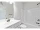 Clean bathroom featuring a shower and tub with modern fixtures at 3823 Dragon Fly Ln, Loganville, GA 30052