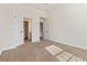 Bright bedroom with vaulted ceilings and multiple entryways at 3823 Dragon Fly Ln, Loganville, GA 30052