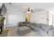 Inviting living room with a fireplace and comfortable seating, flowing into the laundry room at 3823 Dragon Fly Ln, Loganville, GA 30052