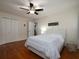 Bedroom featuring closet, ceiling fan, and view of hallway at 517 Sheritan Sw Way, Smyrna, GA 30082