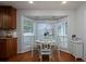 Bright breakfast nook with windows overlooking backyard and outdoor living at 517 Sheritan Sw Way, Smyrna, GA 30082