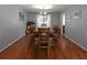 Spacious dining room with hardwood floors and seating for ten at 517 Sheritan Sw Way, Smyrna, GA 30082