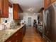 Gourmet kitchen with stainless appliances, granite counters and hardwood floors at 517 Sheritan Sw Way, Smyrna, GA 30082