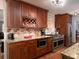 Modern kitchen featuring granite countertops, stainless steel appliances, and custom cabinetry at 517 Sheritan Sw Way, Smyrna, GA 30082