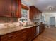 Kitchen with hardwood floors, stainless appliances, and beautiful granite countertops at 517 Sheritan Sw Way, Smyrna, GA 30082