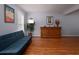 Comfortable living room with hardwood floors, a cozy sofa, and elegant decor at 517 Sheritan Sw Way, Smyrna, GA 30082