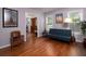Bright living room featuring hardwood floors, ample natural light, and stylish decor at 517 Sheritan Sw Way, Smyrna, GA 30082