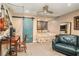 Finished basement with entertainment area and sleeping nook; Barn Door Entrance at 2452 Camp Mitchell Rd, Grayson, GA 30017