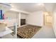 Finished basement features white walls, neutral rug, and lighting at 2452 Camp Mitchell Rd, Grayson, GA 30017