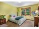 Inviting bedroom with a view of nature through a window; fish tank included at 2452 Camp Mitchell Rd, Grayson, GA 30017