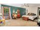 A well-decorated bedroom with hardwood floors and natural light at 2452 Camp Mitchell Rd, Grayson, GA 30017