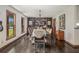 Elegant dining room features stylish decor, hardwood floors, and ample natural light at 2452 Camp Mitchell Rd, Grayson, GA 30017