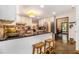Open kitchen featuring a breakfast bar with seating and modern appliances at 2452 Camp Mitchell Rd, Grayson, GA 30017