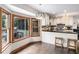Bright eat-in kitchen with updated appliances and hardwood floors at 2452 Camp Mitchell Rd, Grayson, GA 30017