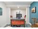 Stylish home office featuring a wood desk, colorful accents, and white trim throughout at 2452 Camp Mitchell Rd, Grayson, GA 30017