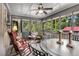 Cozy sunroom with comfortable seating and views of lush greenery at 2452 Camp Mitchell Rd, Grayson, GA 30017