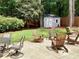 Backyard patio with seating, a storage shed, and a mature landscape at 2917 Townley Cir, Atlanta, GA 30340