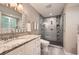 Modern bathroom featuring a walk-in shower and granite countertop at 2917 Townley Cir, Atlanta, GA 30340