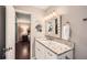 Bathroom vanity features granite countertop, modern fixtures, and soft lighting at 2917 Townley Cir, Atlanta, GA 30340
